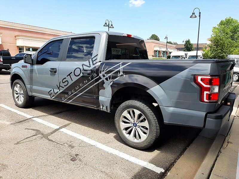 Truck decals with ground guys lettering